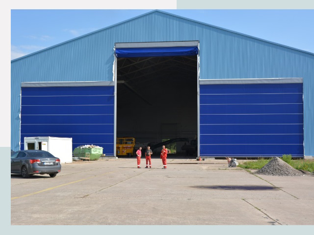 Ангарные ворота в Северодвинск от СтальСтрой-Свр по цене 607 руб.